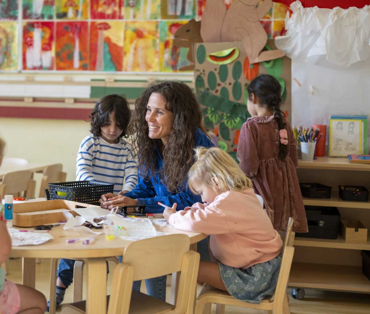 Playgroup Children Engaged in Creative Learning